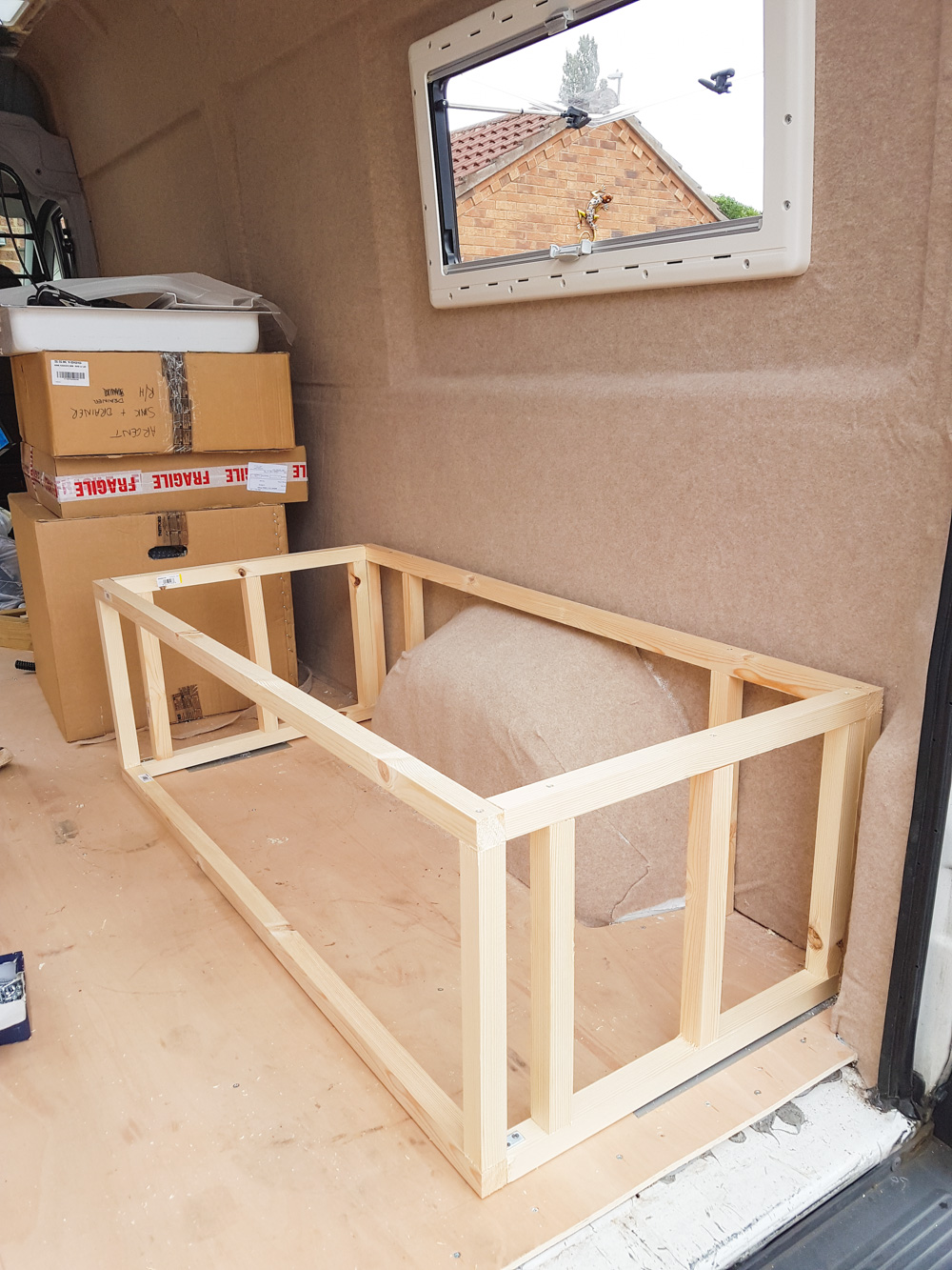 Bed frame for camper deals van